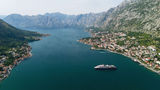 Atlas Ocean Voyages’ World Traveller in Montenegro. Prices for Europe cruises are up this summer.