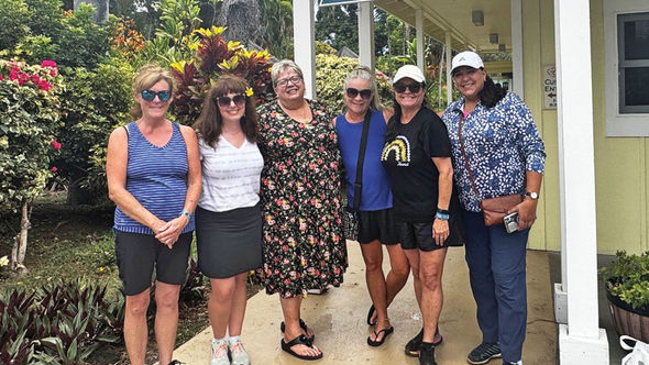 Travel advisor Kristi Emo, third from left, with one of her fam groups at the Punalu'u Bake Shop in Na'alehu on the Big Island of Hawaii.