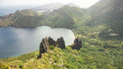 The volcanic pitons towering over the village of Hatiheu on the island of Nuku Hiva.