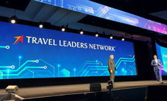 Stephen McGillivray (left) and Cory Voss on stage at Travel Leaders Network's Edge conference.