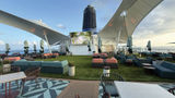 The new Sunset Park on Deck 15 includes an artificial turf lawn, cabanas, plenty of seating, a movie screen and the Sunset Park Cafe.
