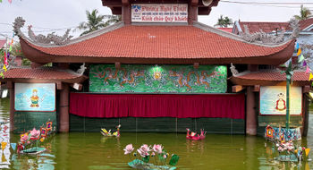 A private Vietnamese water puppet show at a rural community center.