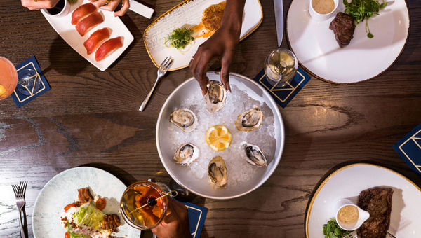 A sampling of the menu items at the Hamilton Princess restaurant Intrepid, which includes oysters, steak and sushi rolls. A sampling of the menu items at the Hamilton Princess restaurant Intrepid, which includes oysters, steak and sushi rolls.