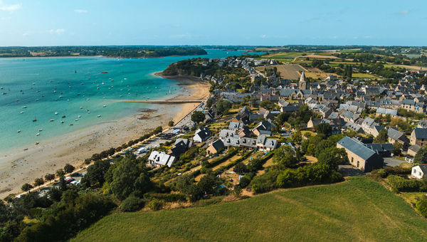 Pedaling along a wide seafront promenade in Saint-Malo in France's Brittany region.