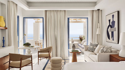 A guestroom at the Four Seasons Hotel Mykonos, which will open its doors this June.