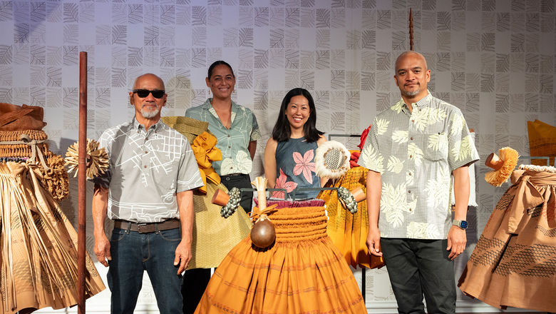 The late Nalani Kanakaole's husband Sig Zane (front left) and son Kuhao Zane (front right), with cocurators Kaui Kanakaole and Sarah Kuaiwa in front of one of the displays.
