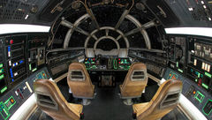 The cockpit of the Millennium Falcon, where guests control the action during Millennium Falcon: Smugglers Run.
