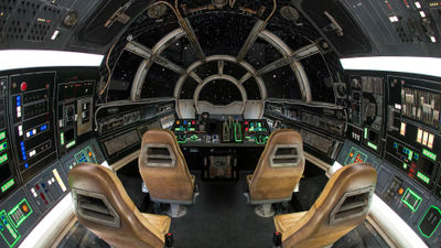 The cockpit of the Millennium Falcon, where guests control the action during Millennium Falcon: Smugglers Run.