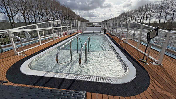 The AmaSofia's sundeck features a walking track, loungers and a pool. The AmaSofia's sundeck features a walking track, loungers and a pool.