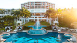 The adults-only Hibiscus Serenity Pool and fountains in front of the central tower of the resort.