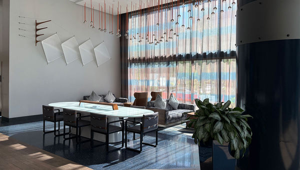The first floor of the Hyatt Centric includes communal work and lounge space as well as a coffee station and a bar. The first floor of the Hyatt Centric includes communal work and lounge space as well as a coffee station and a bar.