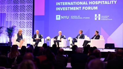 A panel discussion at the 2026 NYU International Hospitality Investment Forum, featuring (left to right) CNBC’s Sara Eisen, Hilton CEO Christopher Nassetta, Hyatt CEO Mark Hoplamazian, Accor CEO Sebastien Bazin and IHG Hotels & Resorts CEO Elie Maalouf.