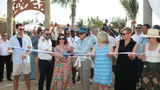 Carnival Cruise Line president Christine Duffy cuts the ribbon on upgrades at RelaxAway, Half Moon Cay.