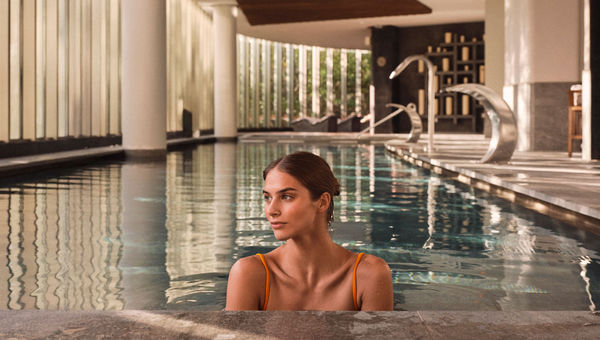 Hydrotherapy stations line the pool. Hydrotherapy stations line the pool.