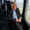 Viking chairman Tor Hagen looking out the window of a Zeppelin over Cologne, Germany.