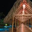 Long palapas lead W Punta Cana guests from the outdoor lobby, bars and restaurants to the pool, hotel rooms and the beach.