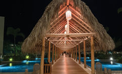 Long palapas lead W Punta Cana guests from the outdoor lobby, bars and restaurants to the pool, hotel rooms and the beach.