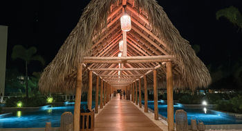 Long palapas lead W Punta Cana guests from the outdoor lobby, bars and restaurants to the pool, hotel rooms and the beach.