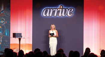 Ragan Stone, senior vice president of In the Know Experiences, on stage during Global Travel Collection's Arrive 2026.