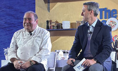 Carnival chief culinary officer Emeril Lagasse (left) with Carnival vice president of food and beverage Juan Fernandez at a June 11 event in New Orleans.