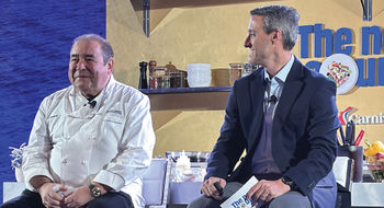 Carnival chief culinary officer Emeril Lagasse (left) with Carnival vice president of food and beverage Juan Fernandez at a June 11 event in New Orleans.