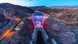 Hoover Dam is illuminated in patriotic colors at dusk each night through July 4, part of southern Nevada’s celebration of America250.