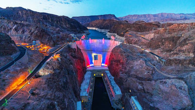 Hoover Dam is illuminated in patriotic colors at dusk each night through July 4, part of southern Nevada’s celebration of America250.