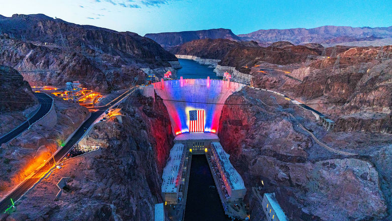 Hoover Dam is illuminated in patriotic colors at dusk each night through July 4, part of southern Nevada’s celebration of America250.