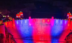 Hoover Dam is illuminated in patriotic colors at dusk each night through July 4, part of southern Nevada’s celebration of America250.