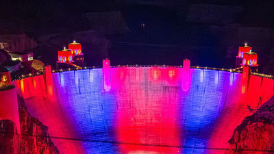 Hoover Dam is illuminated in patriotic colors at dusk each night through July 4, part of southern Nevada’s celebration of America250.