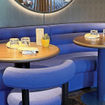 Seating at Mexican restaurant Pink Agave on the Brilliant Lady.