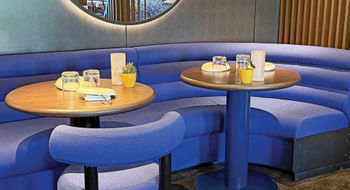 Seating at Mexican restaurant Pink Agave on the Brilliant Lady.