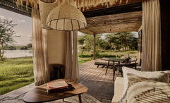 Each suite at Kitirua Plains Lodge includes a shaded private veranda overlooking a 128-acre private concession bordering Amboseli National Park.