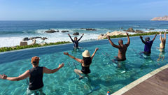 A water cycling class is led by Cintya Ventura, wellness manager for the Grand Velas Los Cabos and the Grand Velas Boutique Los Cabos.