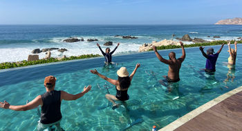 A water cycling class is led by Cintya Ventura, wellness manager for the Grand Velas Los Cabos and the Grand Velas Boutique Los Cabos.