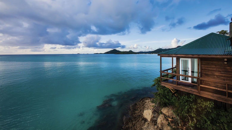 The adults-only Cocos Hotel Antigua Resort has 44 screen-free, hillside cottages.