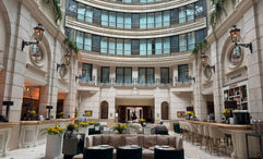 The atrium of the Paris Marriott Champs Elysees houses its Jenny restaurant.