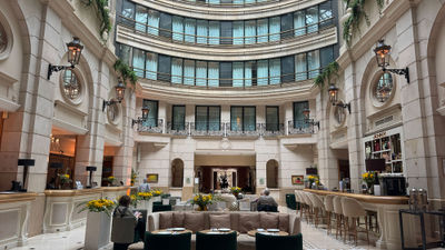 The atrium of the Paris Marriott Champs Elysees houses its Jenny restaurant.