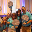 Boardroom leaders at Global Travel Marketplace North America gear up to take groups of travel advisors to their small-group meetings; right is Group E leader Tim Sawhook, the owner of Exclusive Travel Partners. The event, held this month in Hollywood, Fla., brought together about 190 advisors and more than 200 supplier reps for networking.