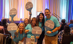 Boardroom leaders at Global Travel Marketplace North America gear up to take groups of travel advisors to their small-group meetings; right is Group E leader Tim Sawhook, the owner of Exclusive Travel Partners. The event, held this month in Hollywood, Fla., brought together about 190 advisors and more than 200 supplier reps for networking.