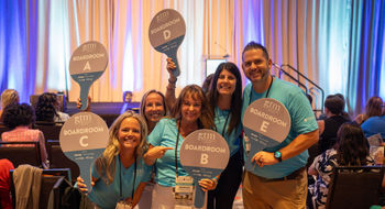 Boardroom leaders at Global Travel Marketplace North America gear up to take groups of travel advisors to their small-group meetings; right is Group E leader Tim Sawhook, the owner of Exclusive Travel Partners. The event, held this month in Hollywood, Fla., brought together about 190 advisors and more than 200 supplier reps for networking.