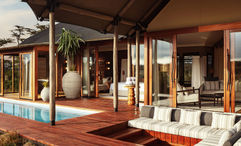 Accommodations at the JW Marriott Mount Kenya Rhino Reserve Safari Camp have private decks and plunge pools.
