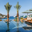 The main pool at Crete’s Daios Cove has the scenic Vathi Bay as its backdrop.