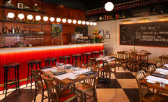 Sale Pepe Pizzeria e Cucina's new location creates a welcoming environment that transports you to Italy.