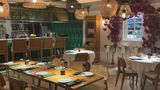 Caya House Aruba showcases Latin-Caribbean flavors in a modern dining space.