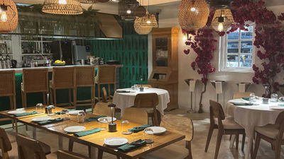 Caya House Aruba showcases Latin-Caribbean flavors in a modern dining space.
