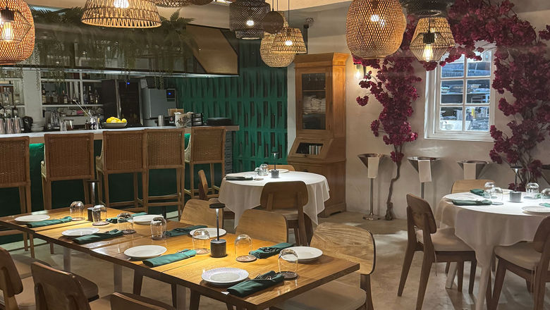 Caya House Aruba showcases Latin-Caribbean flavors in a modern dining space.