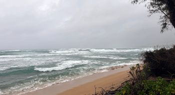 At least two hurricanes have brushed by Hawaii in a month; this image was taken on Kauai during the arrival of Lala in August.
