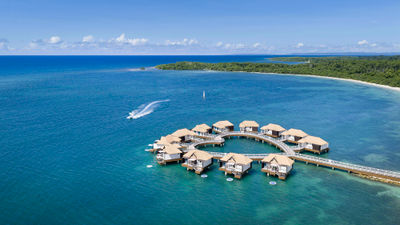 Overwater villas at the Sandals South Coast in Jamaica.