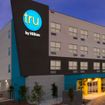 Hilton reports growth in midscale and upper-midscale chains like Tru.